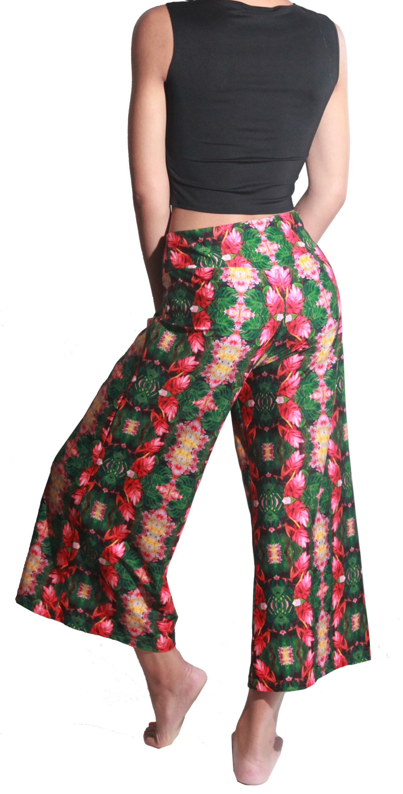 Tropical flowers and plants collaged into this gorgeous unique print. UPF 50 sun protecting fabric. Sustainably made from recycled fabric.