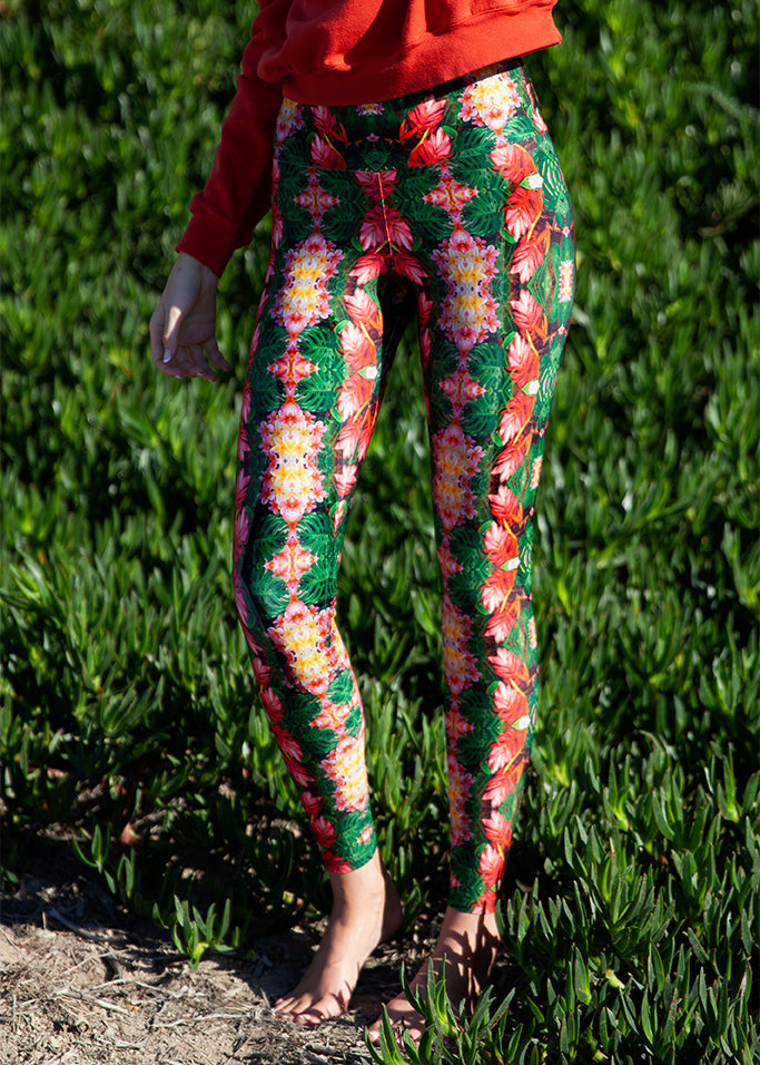 Printed floral leggings. Tropical flowers and plants collaged into this gorgeous unique print. UPF 50 sun protecting fabric. Sustainably made from recycled fabric.